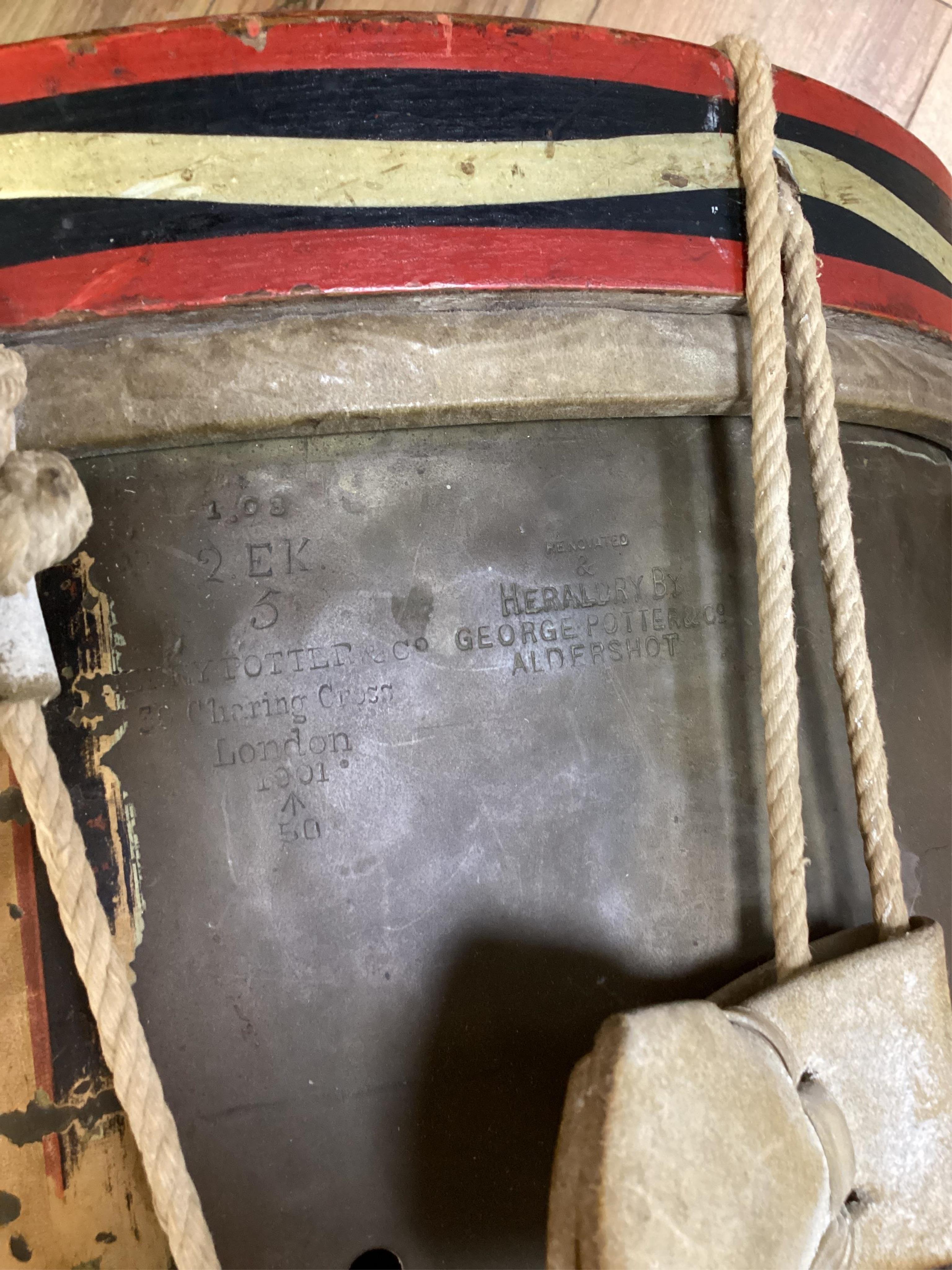 A late 19th/early 20th century Royal East Kent Regiment 'Buffs' regimental drum, 37cm diameter, 37cm high, together with a rope edged, stained pine removable 'table top' adaption
